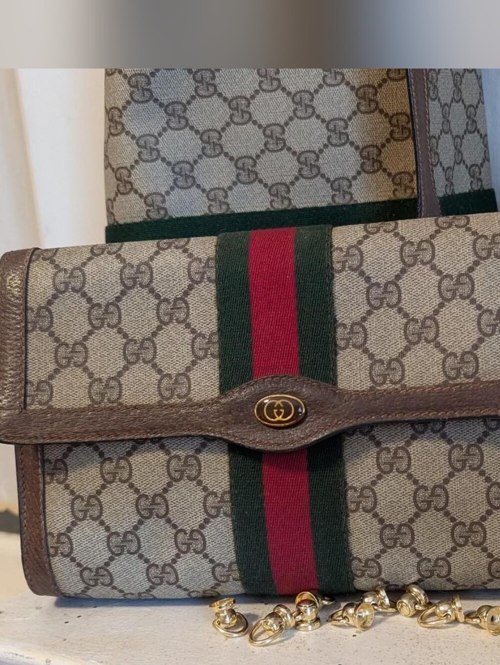 Gucci GG Supreme Clutch